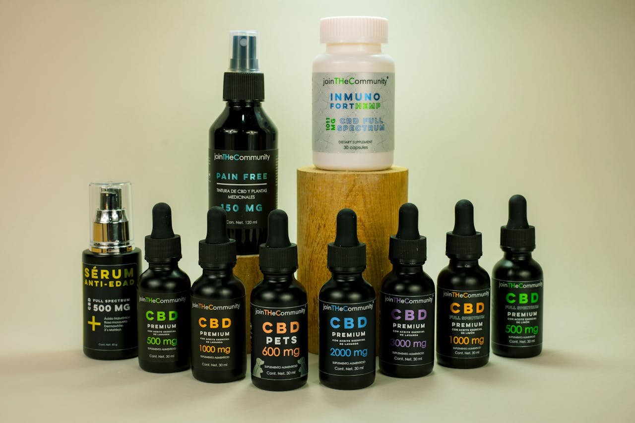 services-01 Various CBD products including serums and capsules on a white background, ideal for wellness and health.